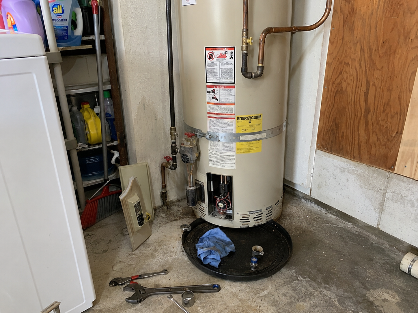 Brooklyn Plumbers technician replacing corroded galvanized pipe in a brownstone cellar plumber brooklyn